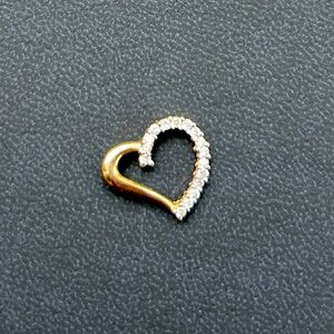 Vintage 10kt and diamond heart shaped pendant